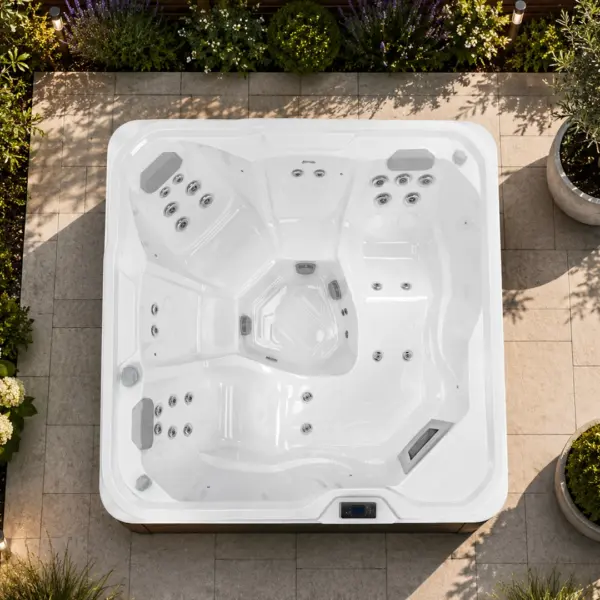 Equinox Nova 570 five-person hot tub in a garden setting